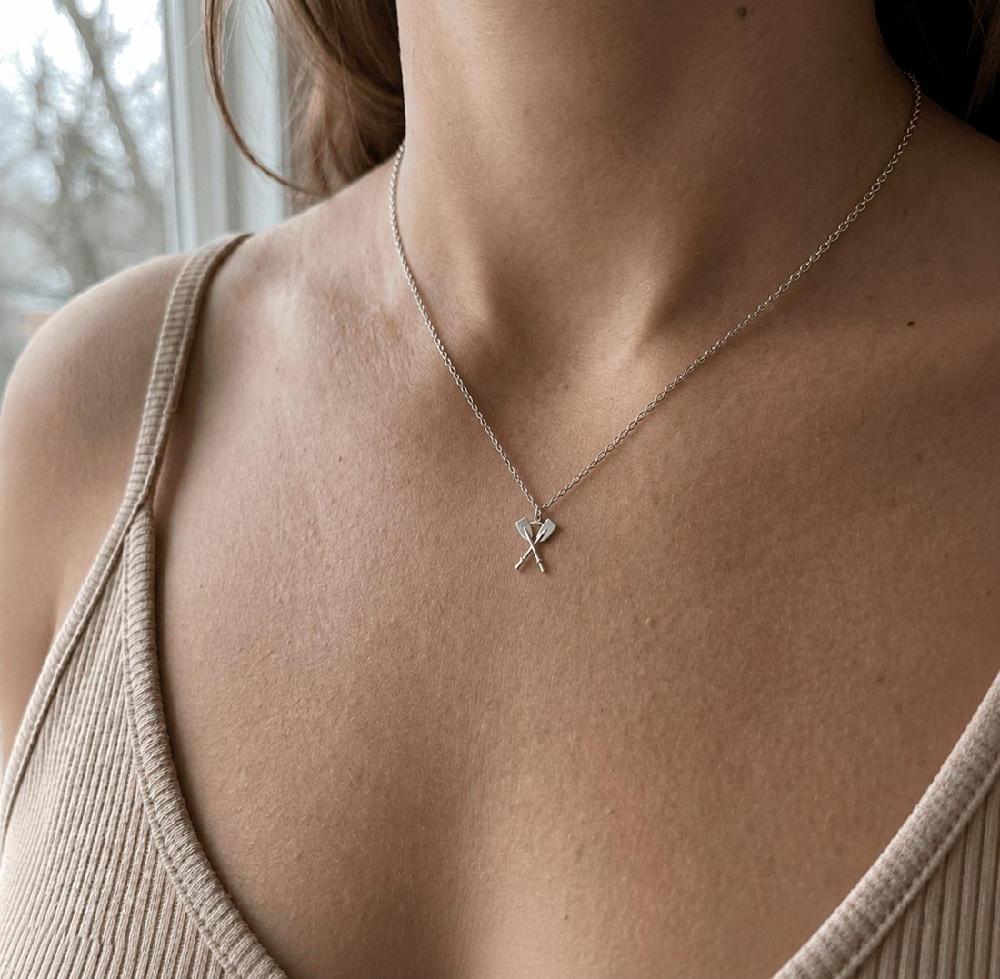 Rowing jewellery arranged as a meaningful coxswain and crew gift